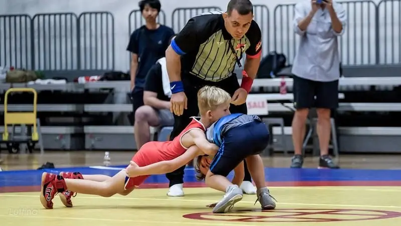 Kids wrestling competition match at MK Academy